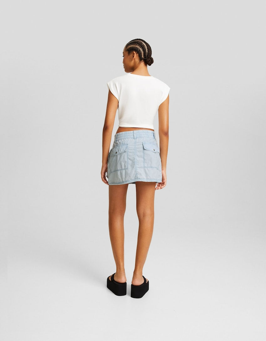 Bershka Faded-effect denim mini cargo skirt