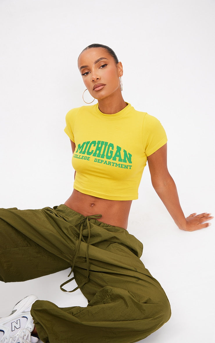PRETTY LITTLE THING YELLOW MICHIGAN PRINTED FITTED CROP T SHIRT
